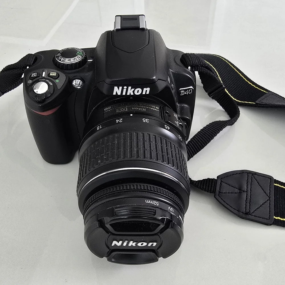 Nikon D40 Black Digital Camera with Two Lenses, Camera Bag And Charging Cord